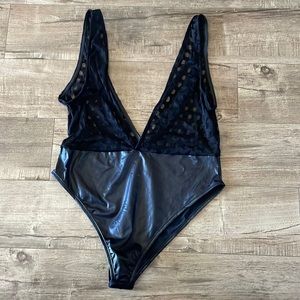 Size 2/3X black lingerie bodysuit new never worn but no tags